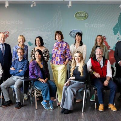 Large group of people posing for the camera smiling