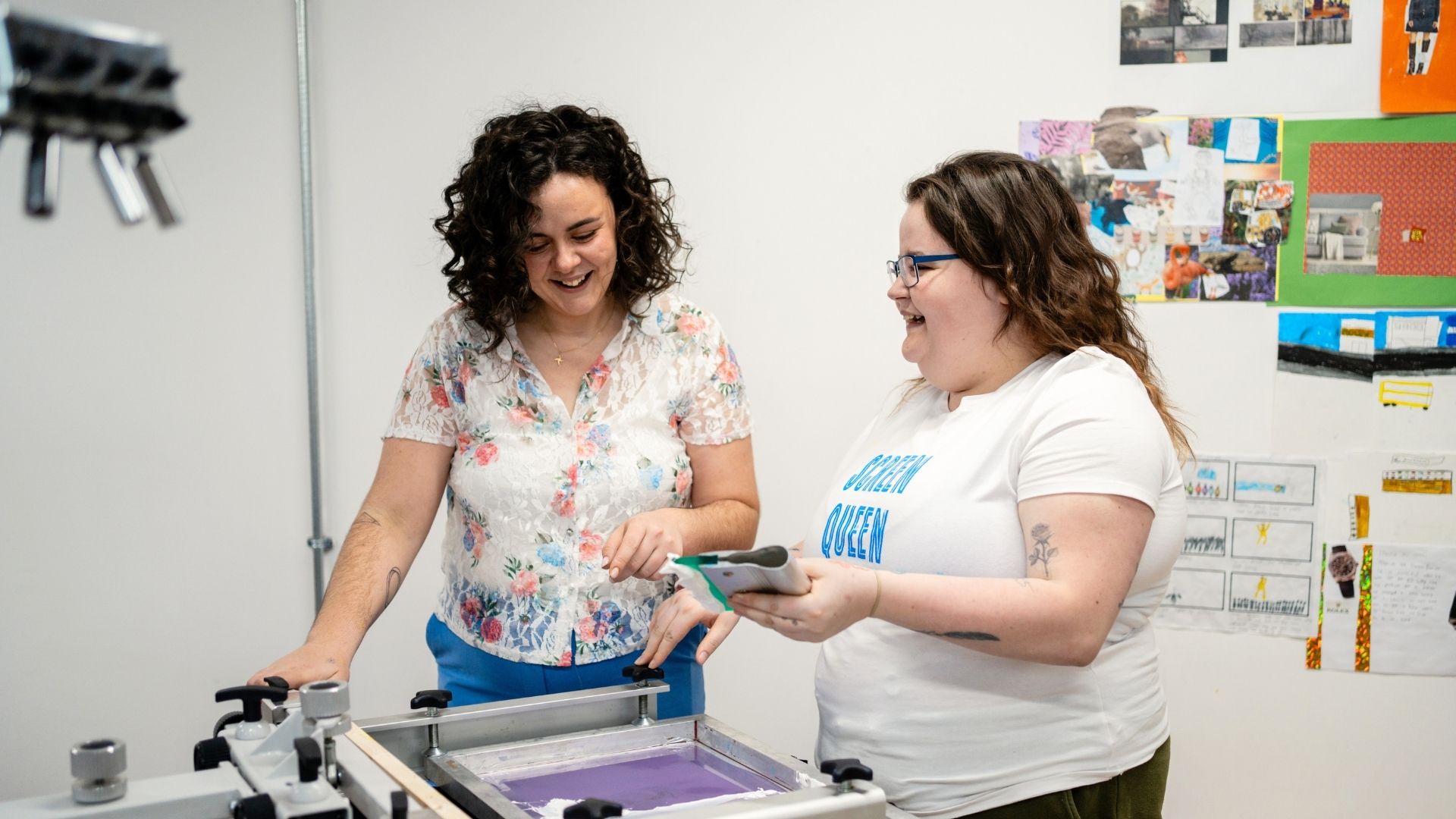 Two women working smiling
